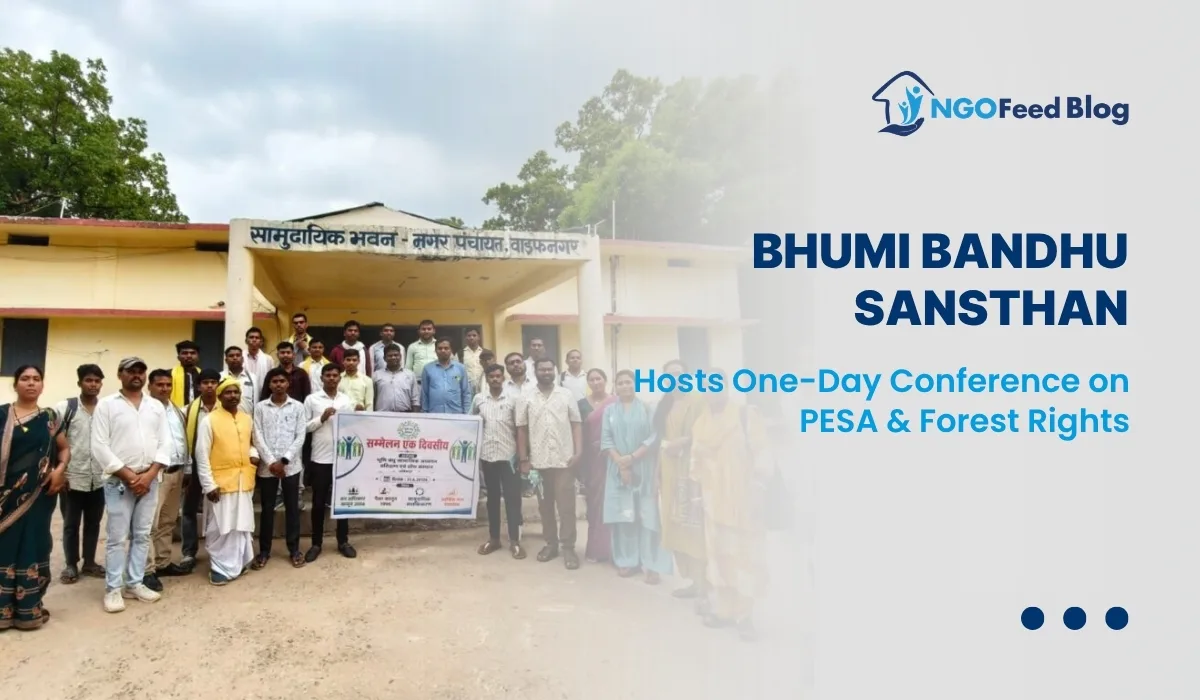 Group photo of participants at Bhumi Bandhu Sansthan's One-Day Conference on the PESA Act, Forest Rights Act, and Community Governance in Wadrafnagar, Chhattisgarh